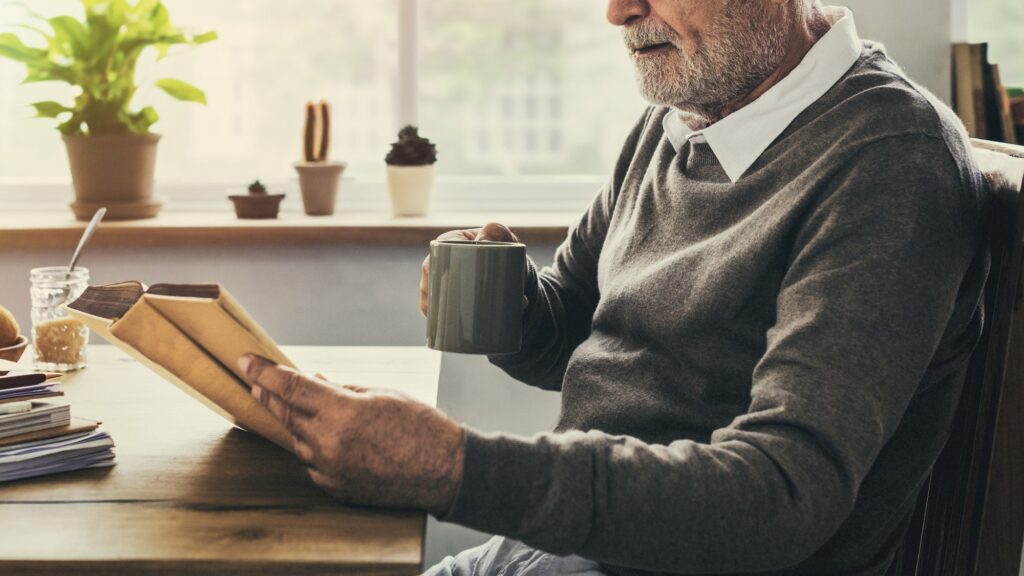 Reading Relaxation Pension Grandfather Coffee Concept